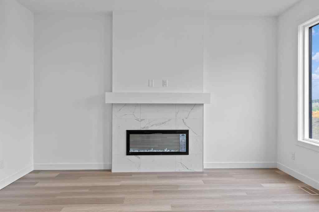 MLS® A2207007 - 1313 South Point Parade SW in South Point Airdrie, Residential