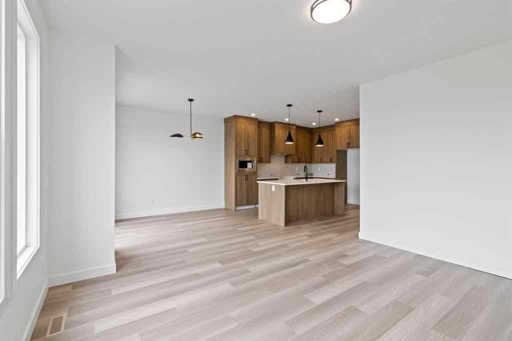 MLS® A2207007 - 1313 South Point Parade SW in South Point Airdrie, Residential