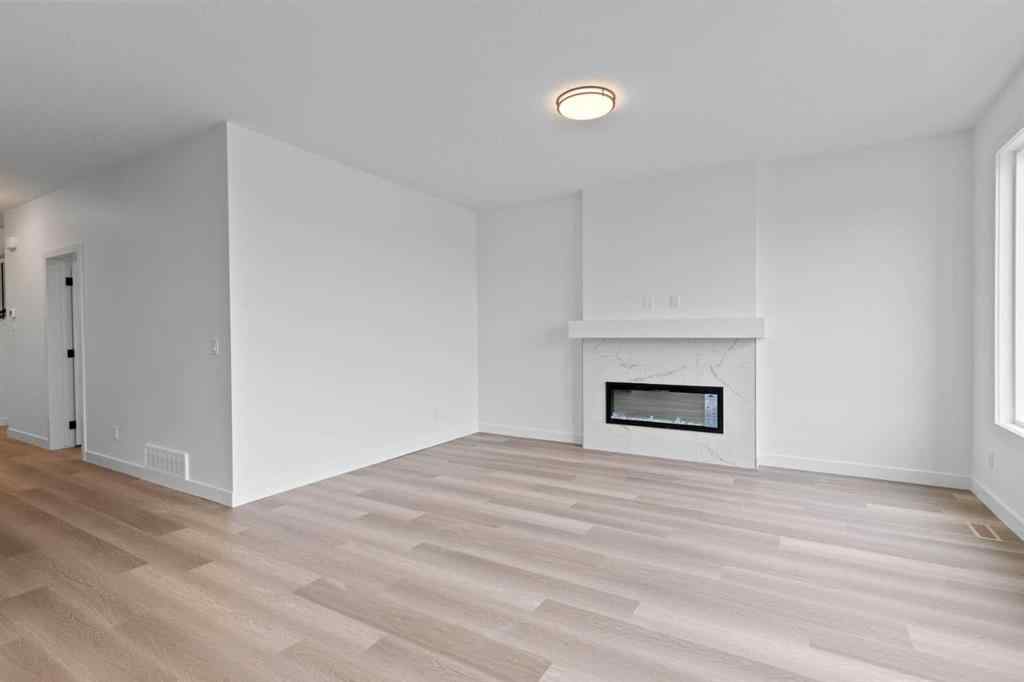MLS® A2207007 - 1313 South Point Parade SW in South Point Airdrie, Residential