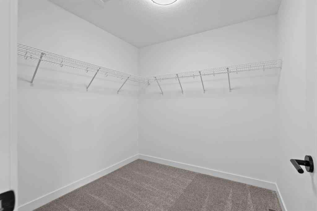 MLS® A2207007 - 1313 South Point Parade SW in South Point Airdrie, Residential