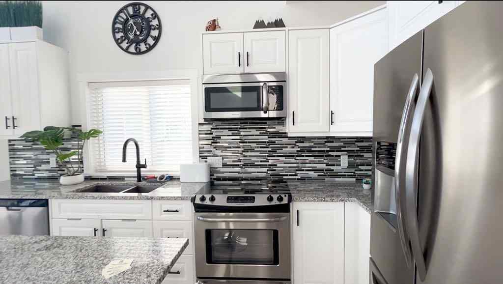 MLS® A2207399 - 456 Cottageclub Cove  in Cottage Club at Ghost Lake Rural Rocky View County, Residential