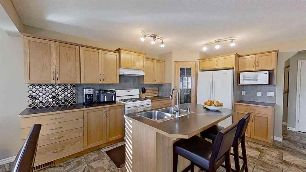 MLS® A2207440 - 9 Prairie Springs Close SW in Prairie Springs Airdrie, Residential