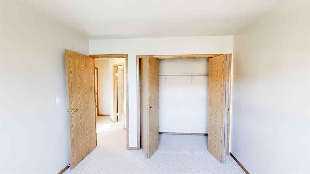 MLS® A2207702 - Unit #C 10029 105 Avenue  in Avondale South Grande Prairie, Residential