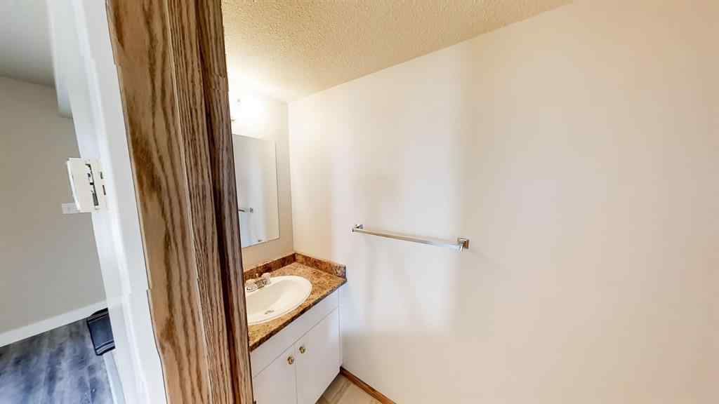 MLS® A2207702 - Unit #C 10029 105 Avenue  in Avondale South Grande Prairie, Residential