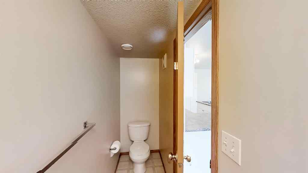 MLS® A2207702 - Unit #C 10029 105 Avenue  in Avondale South Grande Prairie, Residential
