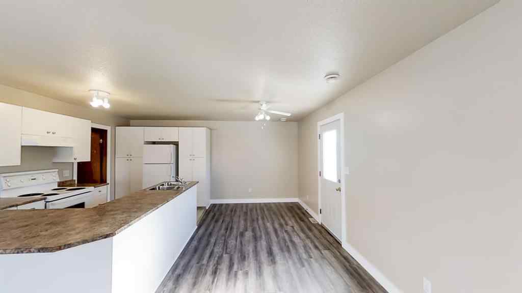 MLS® A2207702 - Unit #C 10029 105 Avenue  in Avondale South Grande Prairie, Residential