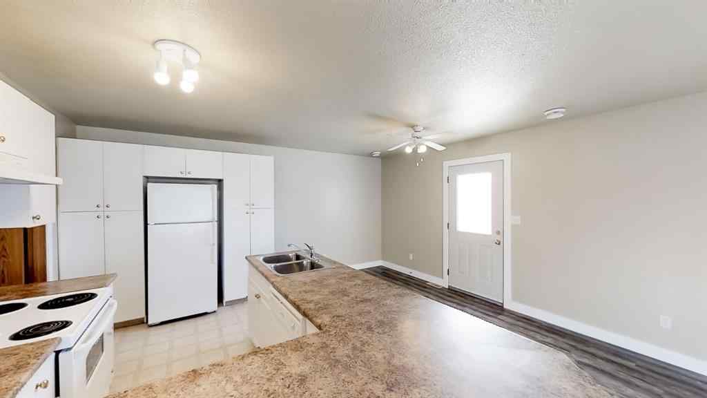 MLS® A2207702 - Unit #C 10029 105 Avenue  in Avondale South Grande Prairie, Residential