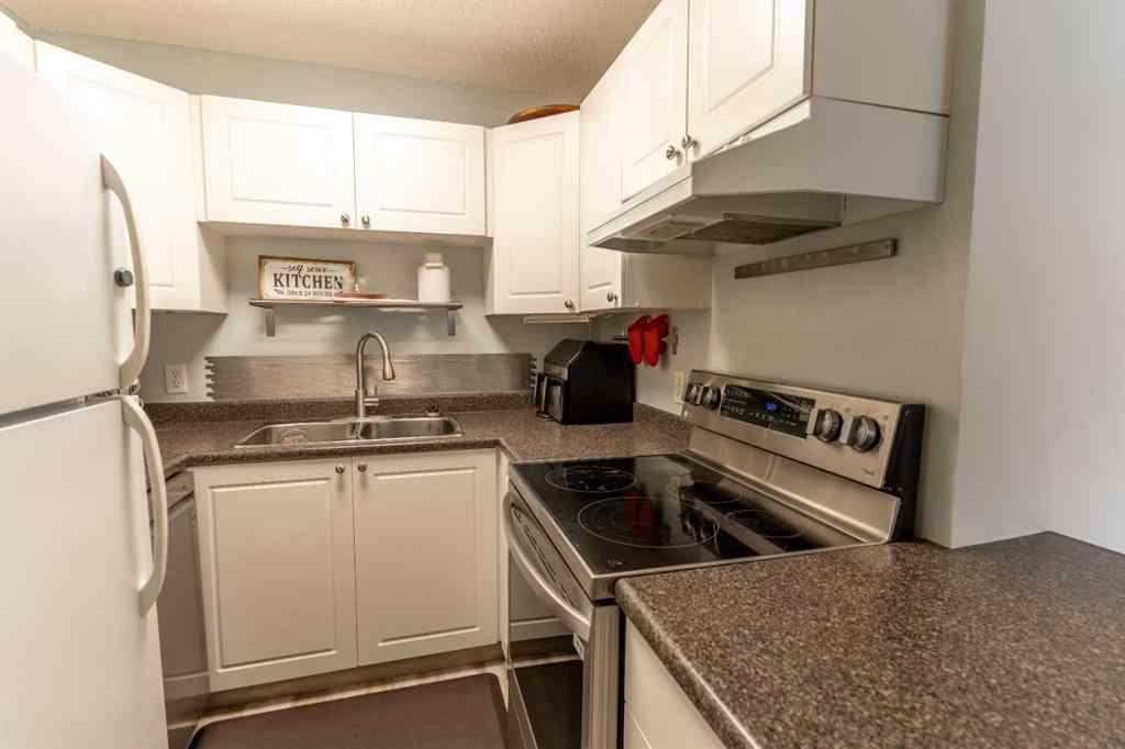 MLS® A2207821 - Unit #104 9 Country Village Bay NE in Country Hills Village Calgary, Residential