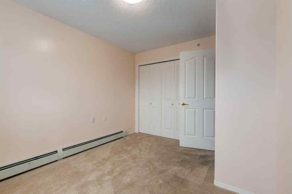 MLS® A2208203 - Unit #415 5000 Somervale Court SW in Somerset Calgary, Residential