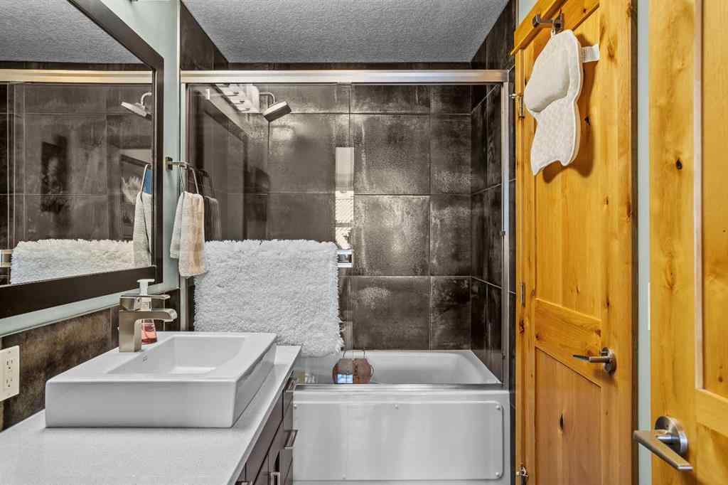 MLS® A2208496 - Unit #304 2100A Stewart Creek Drive  in Three Sisters Canmore, Residential