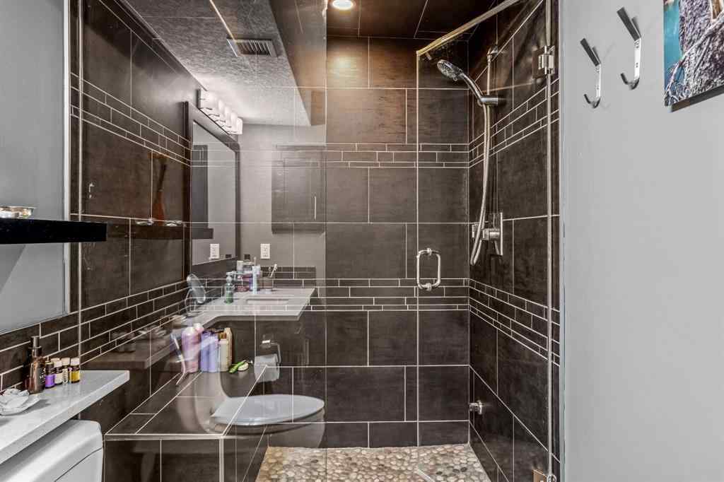 MLS® A2208496 - Unit #304 2100A Stewart Creek Drive  in Three Sisters Canmore, Residential