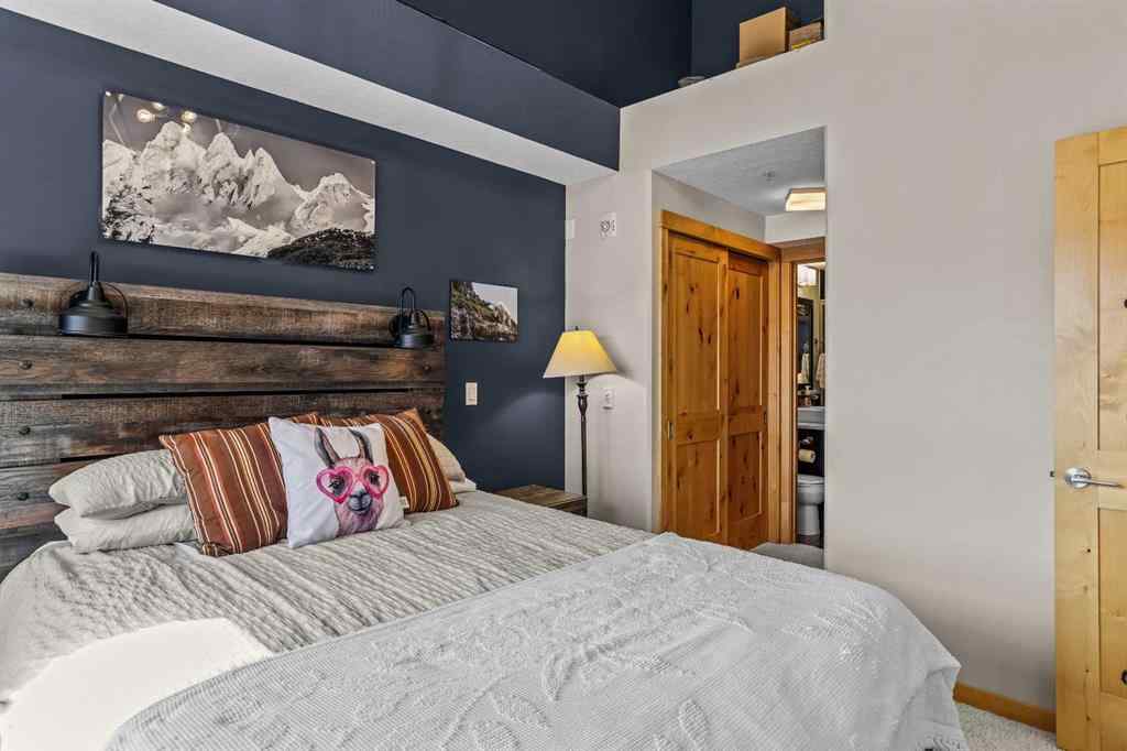 MLS® A2208496 - Unit #304 2100A Stewart Creek Drive  in Three Sisters Canmore, Residential