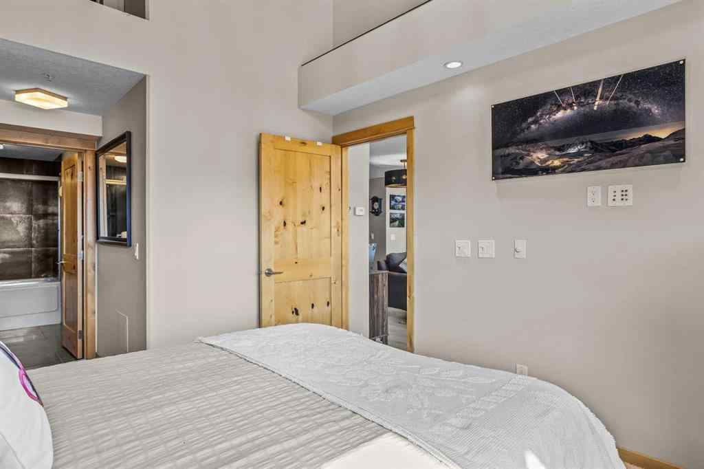 MLS® A2208496 - Unit #304 2100A Stewart Creek Drive  in Three Sisters Canmore, Residential