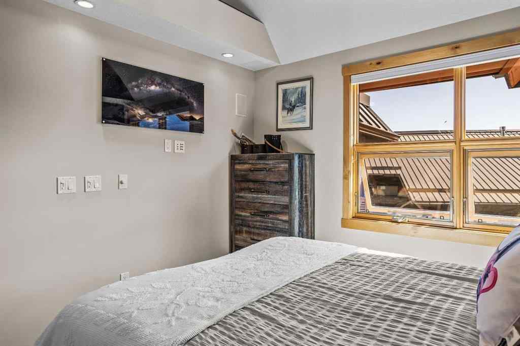 MLS® A2208496 - Unit #304 2100A Stewart Creek Drive  in Three Sisters Canmore, Residential