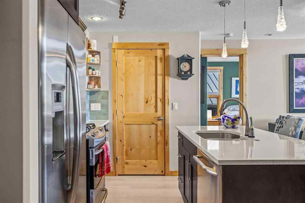 MLS® A2208496 - Unit #304 2100A Stewart Creek Drive  in Three Sisters Canmore, Residential