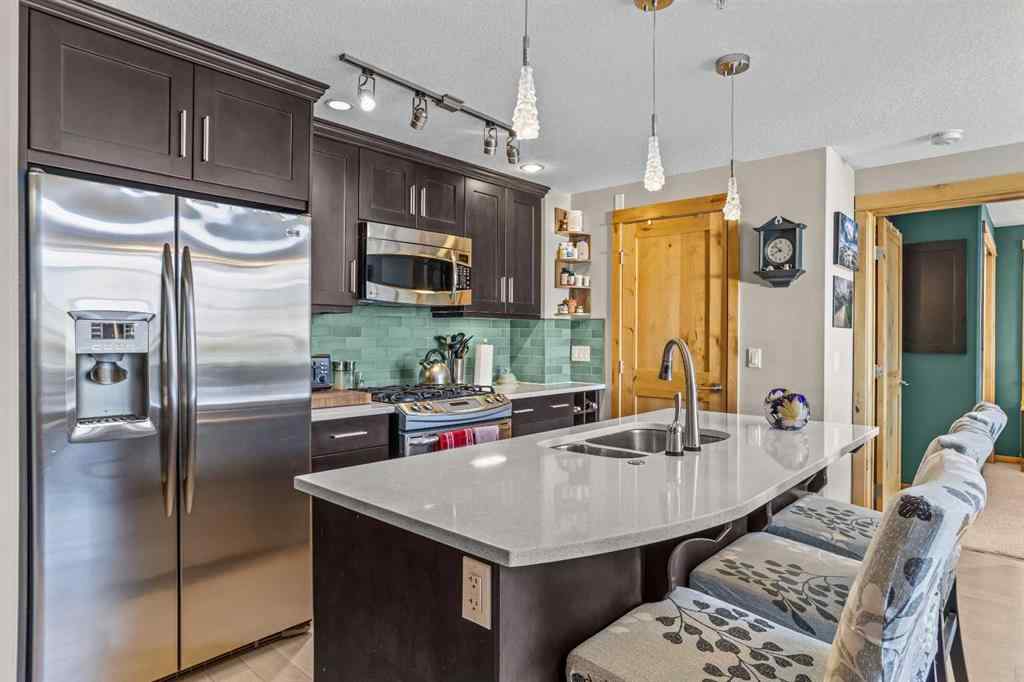 MLS® A2208496 - Unit #304 2100A Stewart Creek Drive  in Three Sisters Canmore, Residential