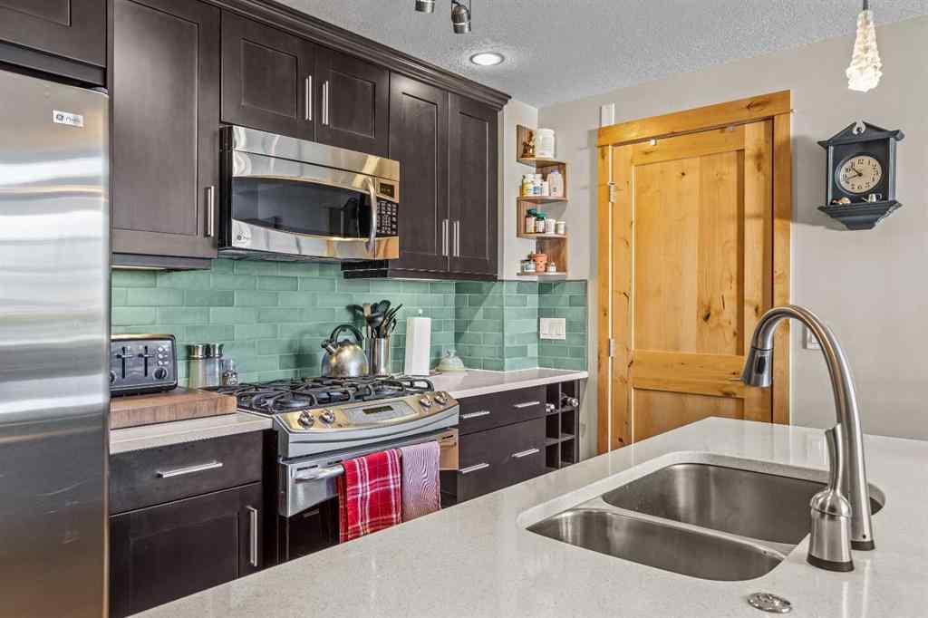 MLS® A2208496 - Unit #304 2100A Stewart Creek Drive  in Three Sisters Canmore, Residential
