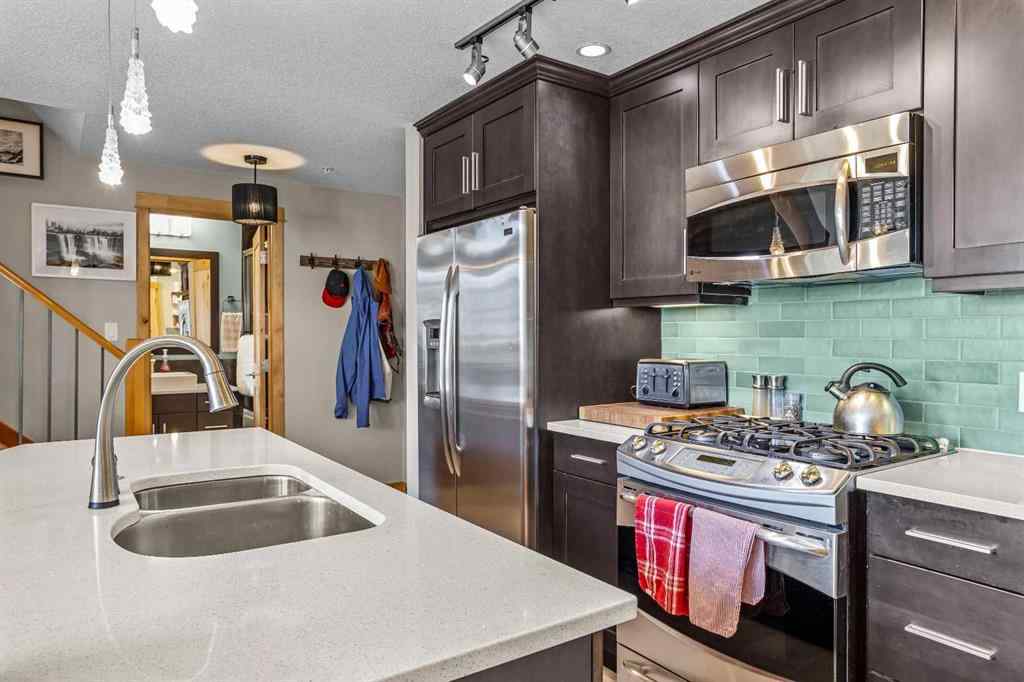 MLS® A2208496 - Unit #304 2100A Stewart Creek Drive  in Three Sisters Canmore, Residential