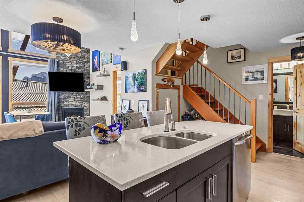 MLS® A2208496 - Unit #304 2100A Stewart Creek Drive  in Three Sisters Canmore, Residential