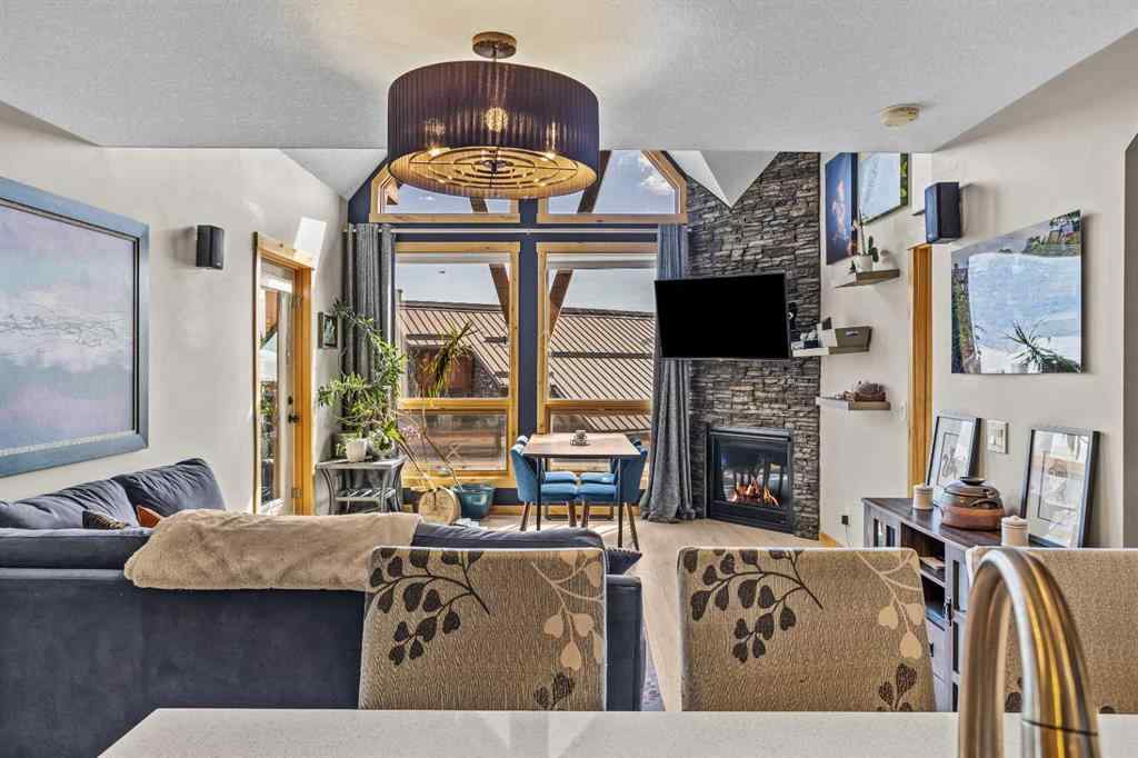 MLS® A2208496 - Unit #304 2100A Stewart Creek Drive  in Three Sisters Canmore, Residential