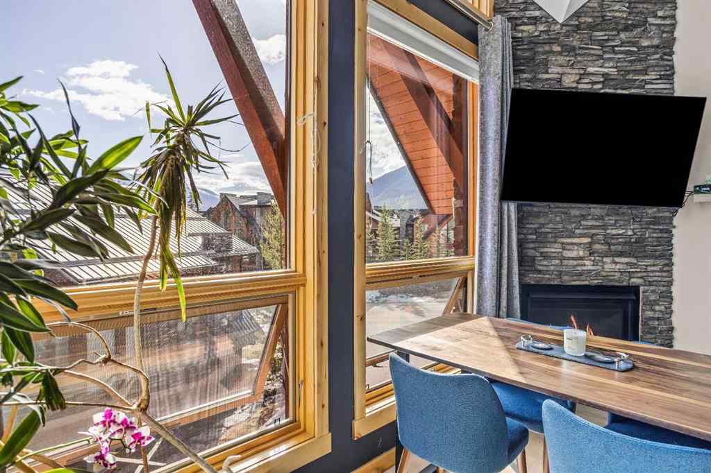 MLS® A2208496 - Unit #304 2100A Stewart Creek Drive  in Three Sisters Canmore, Residential