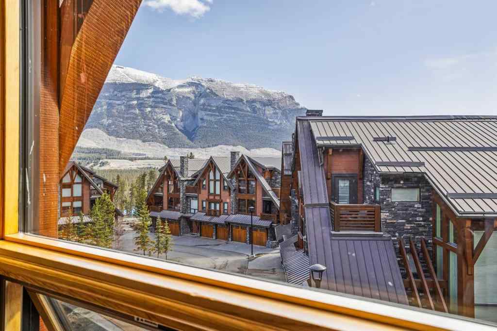 MLS® A2208496 - Unit #304 2100A Stewart Creek Drive  in Three Sisters Canmore, Residential