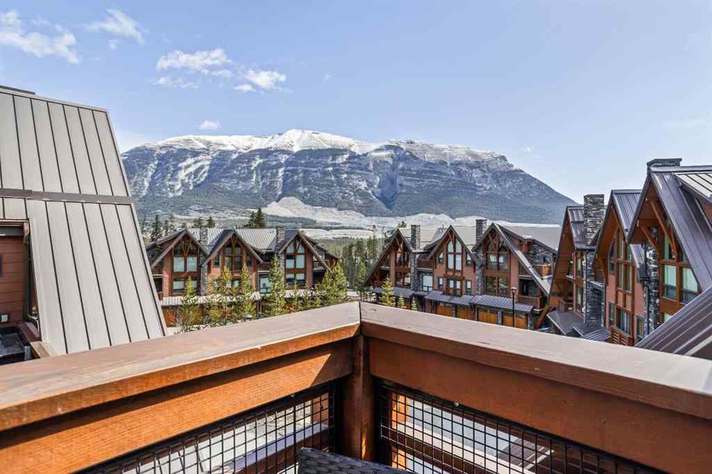 MLS® A2208496 - Unit #304 2100A Stewart Creek Drive  in Three Sisters Canmore, Residential