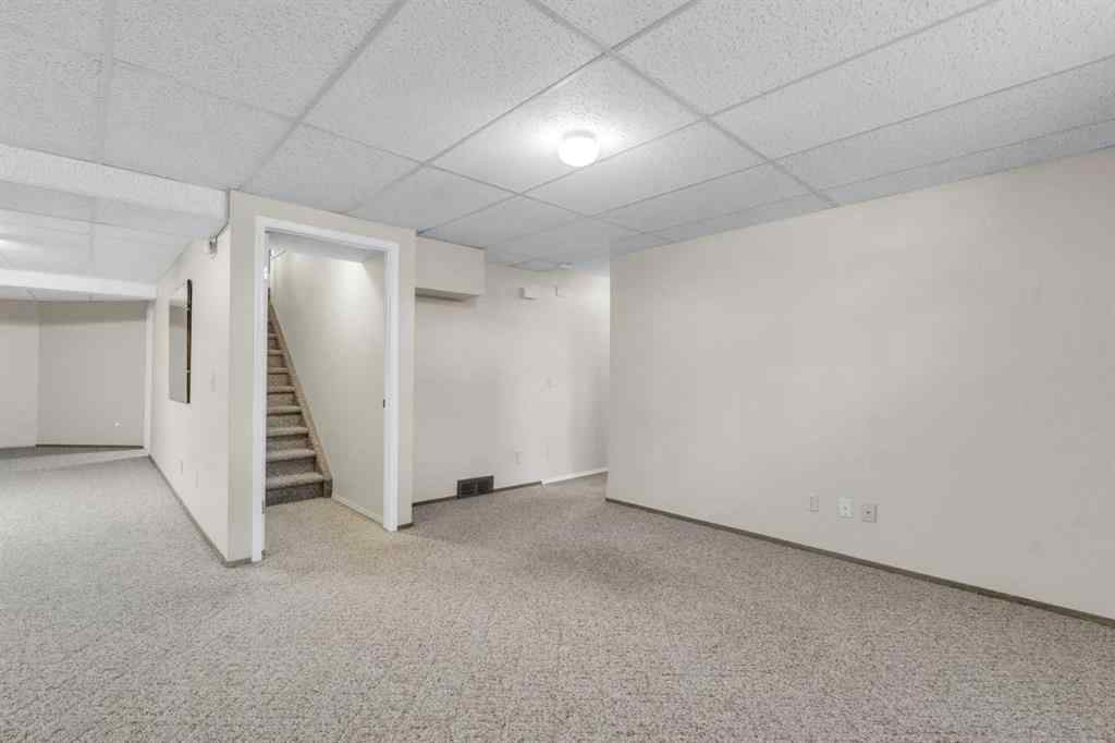 MLS® A2209725 - 11 Coach Side Terrace SW in Coach Hill Calgary, Residential