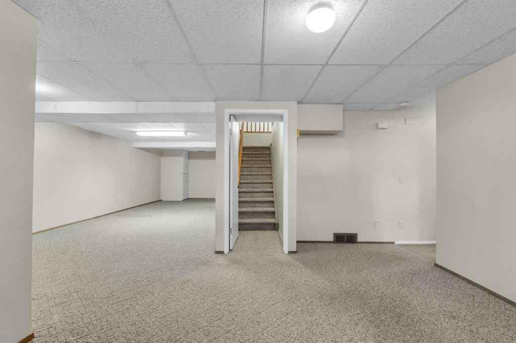 MLS® A2209725 - 11 Coach Side Terrace SW in Coach Hill Calgary, Residential