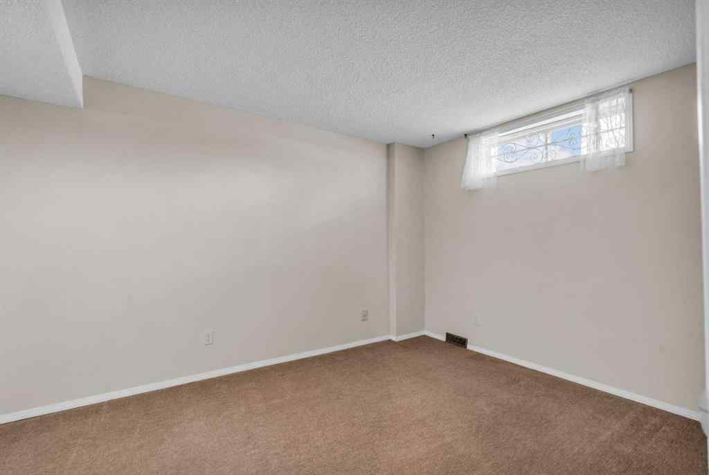 MLS® A2209725 - 11 Coach Side Terrace SW in Coach Hill Calgary, Residential