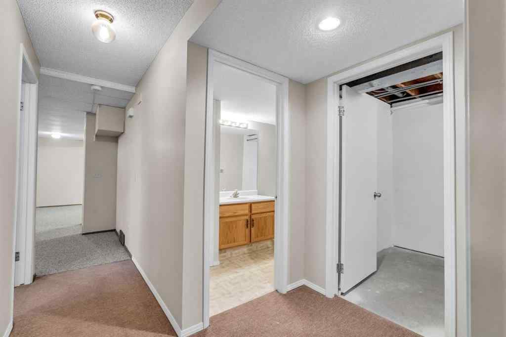 MLS® A2209725 - 11 Coach Side Terrace SW in Coach Hill Calgary, Residential
