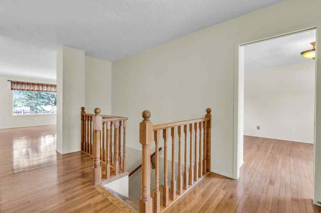 MLS® A2209725 - 11 Coach Side Terrace SW in Coach Hill Calgary, Residential