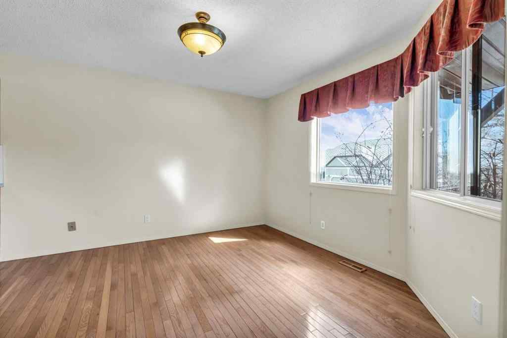 MLS® A2209725 - 11 Coach Side Terrace SW in Coach Hill Calgary, Residential