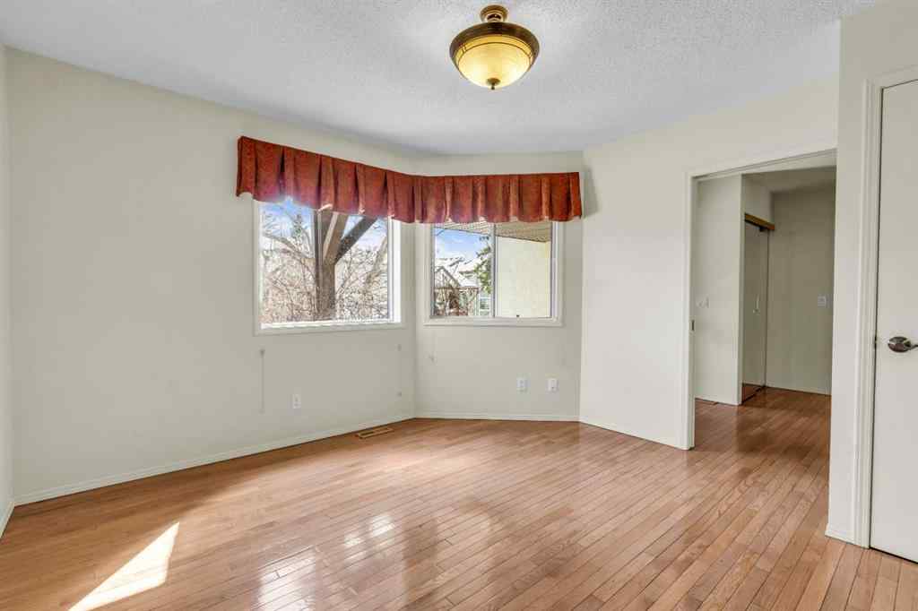 MLS® A2209725 - 11 Coach Side Terrace SW in Coach Hill Calgary, Residential