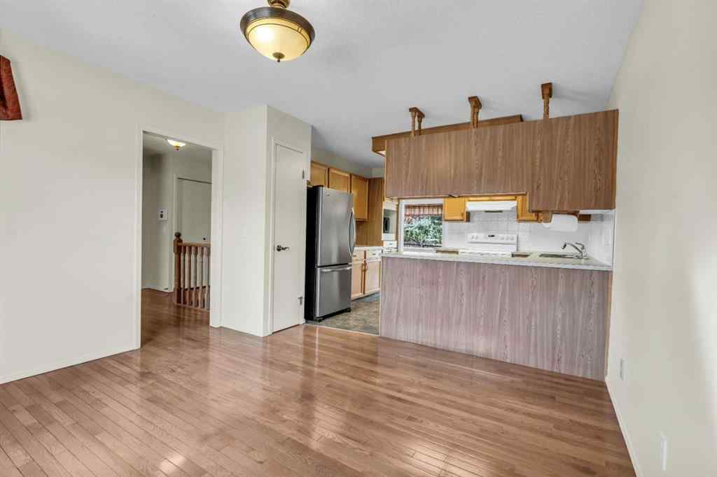 MLS® A2209725 - 11 Coach Side Terrace SW in Coach Hill Calgary, Residential