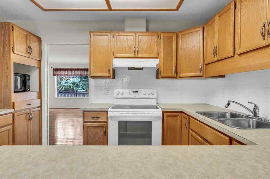 MLS® A2209725 - 11 Coach Side Terrace SW in Coach Hill Calgary, Residential