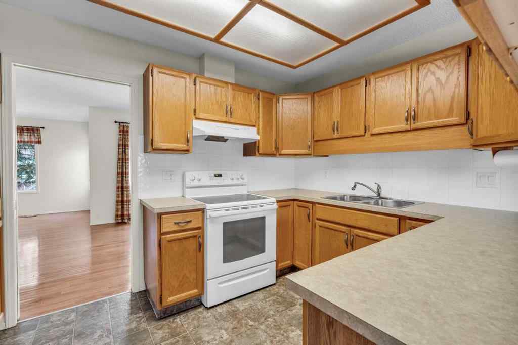 MLS® A2209725 - 11 Coach Side Terrace SW in Coach Hill Calgary, Residential