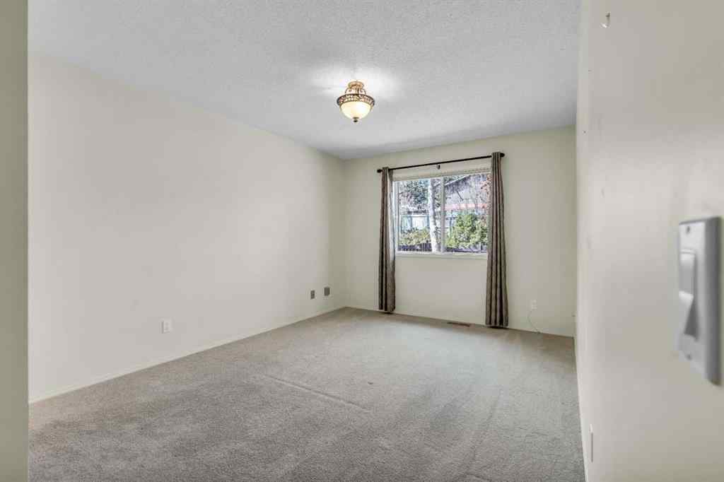 MLS® A2209725 - 11 Coach Side Terrace SW in Coach Hill Calgary, Residential