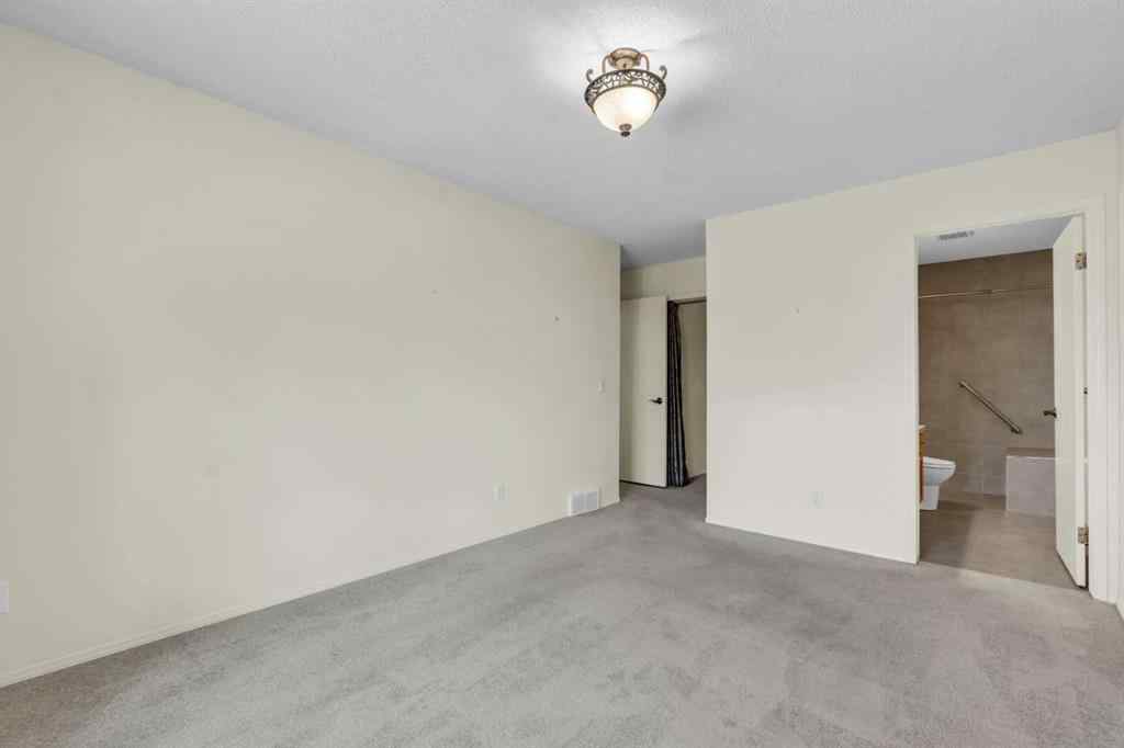 MLS® A2209725 - 11 Coach Side Terrace SW in Coach Hill Calgary, Residential