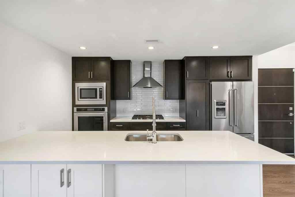 MLS® A2209944 - Unit #106 3320 3 Avenue NW in Parkdale Calgary, Residential