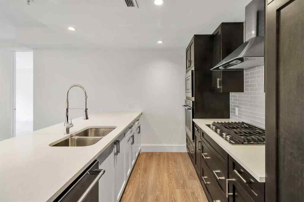 MLS® A2209944 - Unit #106 3320 3 Avenue NW in Parkdale Calgary, Residential