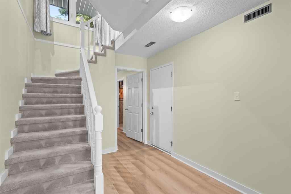 MLS® A2210307 - 22 Coachway Gardens SW in Coach Hill Calgary, Residential