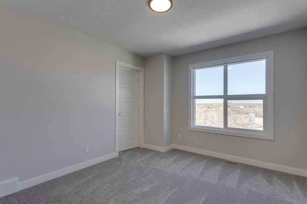 MLS® A2210713 - 11 Lewiston View NE in Lewisburg Calgary, Residential