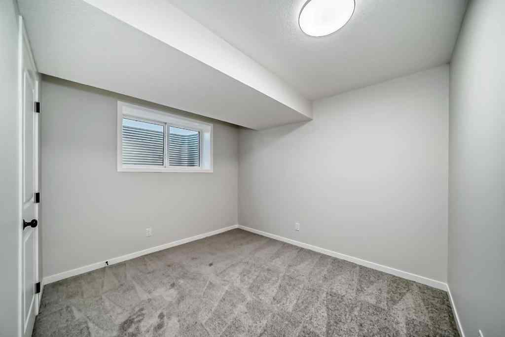 MLS® A2210904 - 208 Lucas Place NW in Livingston Calgary, Residential