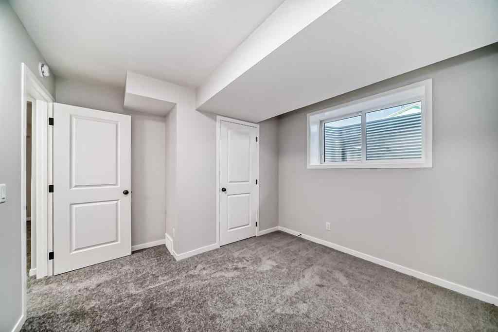 MLS® A2210904 - 208 Lucas Place NW in Livingston Calgary, Residential
