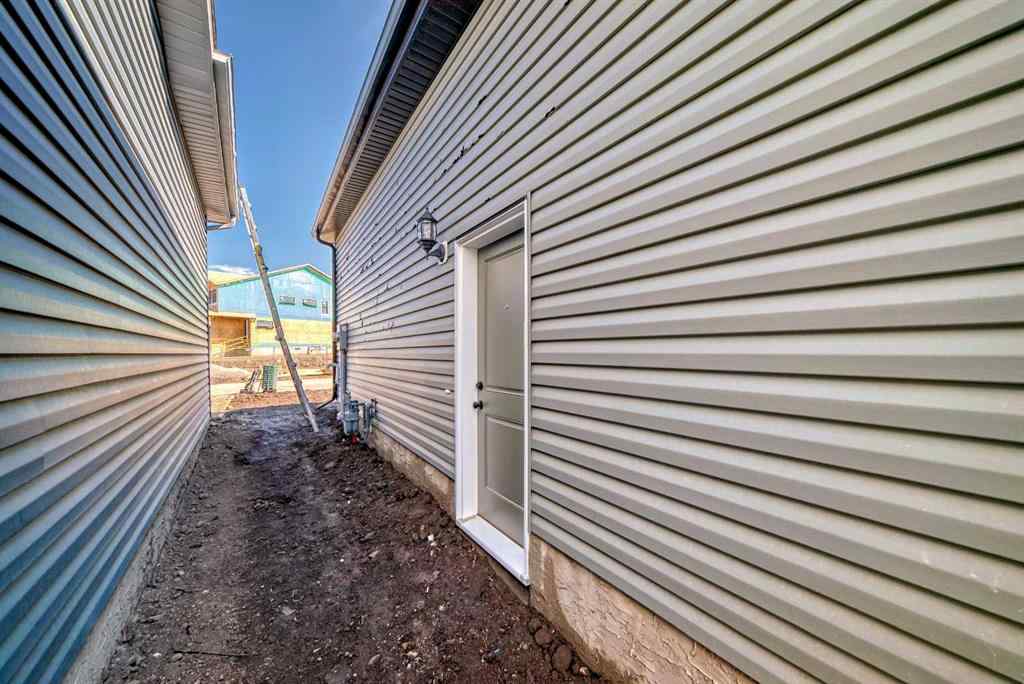 MLS® A2210904 - 208 Lucas Place NW in Livingston Calgary, Residential