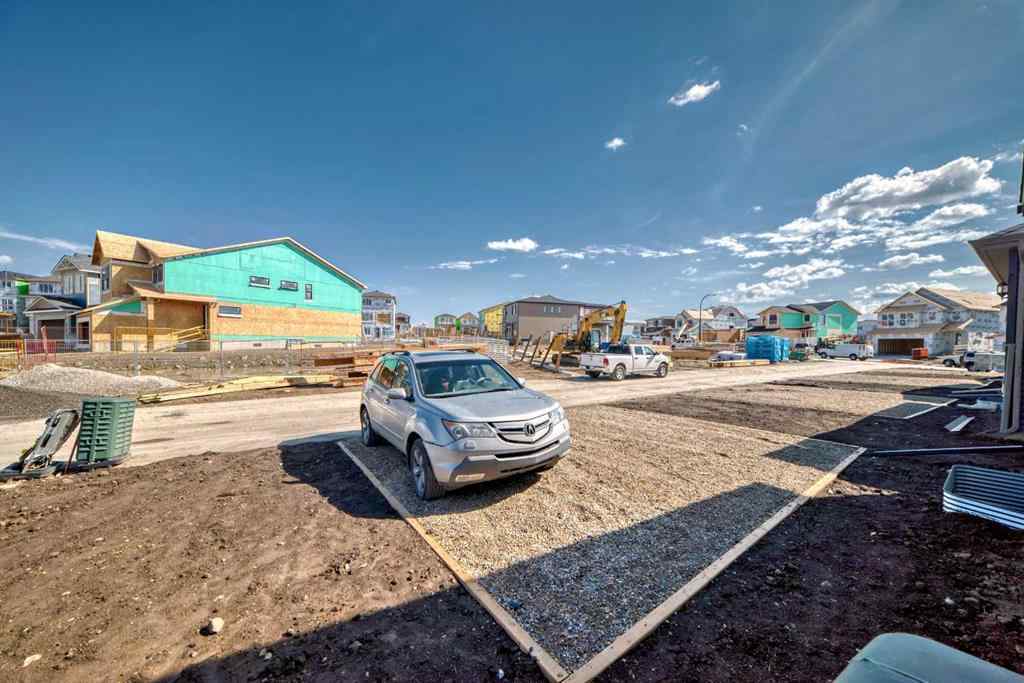 MLS® A2210904 - 208 Lucas Place NW in Livingston Calgary, Residential
