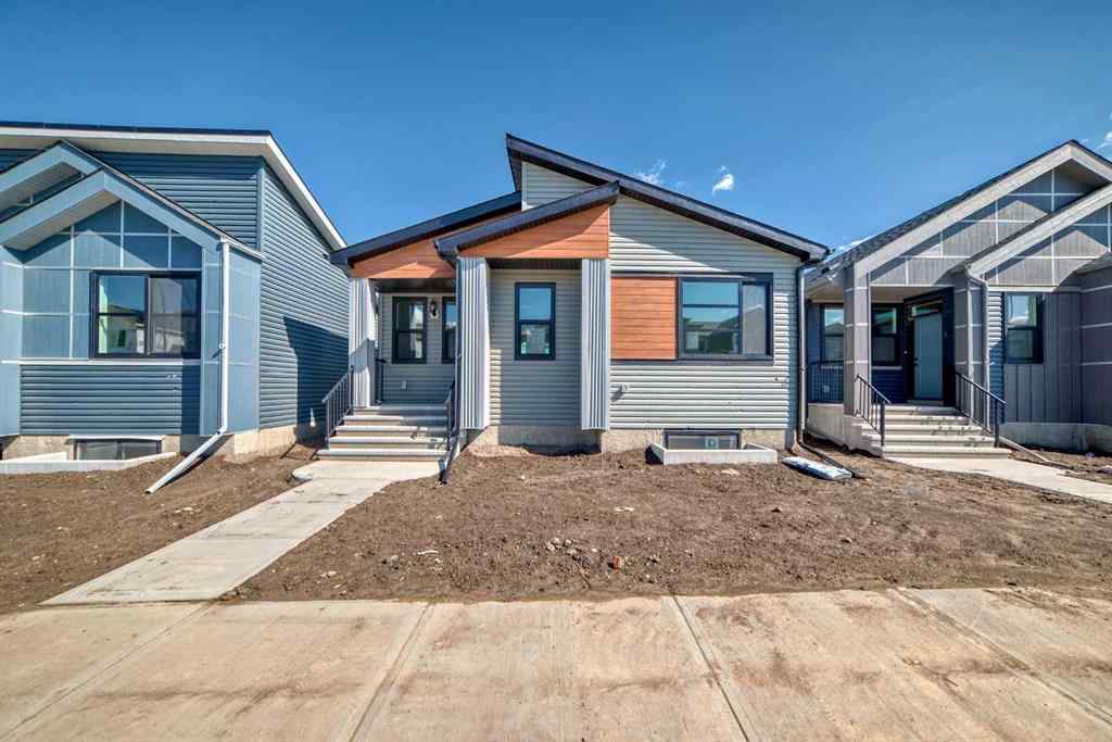 MLS® A2210904 - 208 Lucas Place NW in Livingston Calgary, Residential