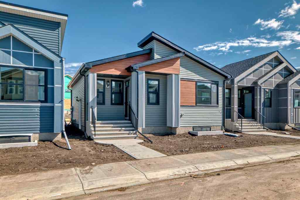 MLS® A2210904 - 208 Lucas Place NW in Livingston Calgary, Residential