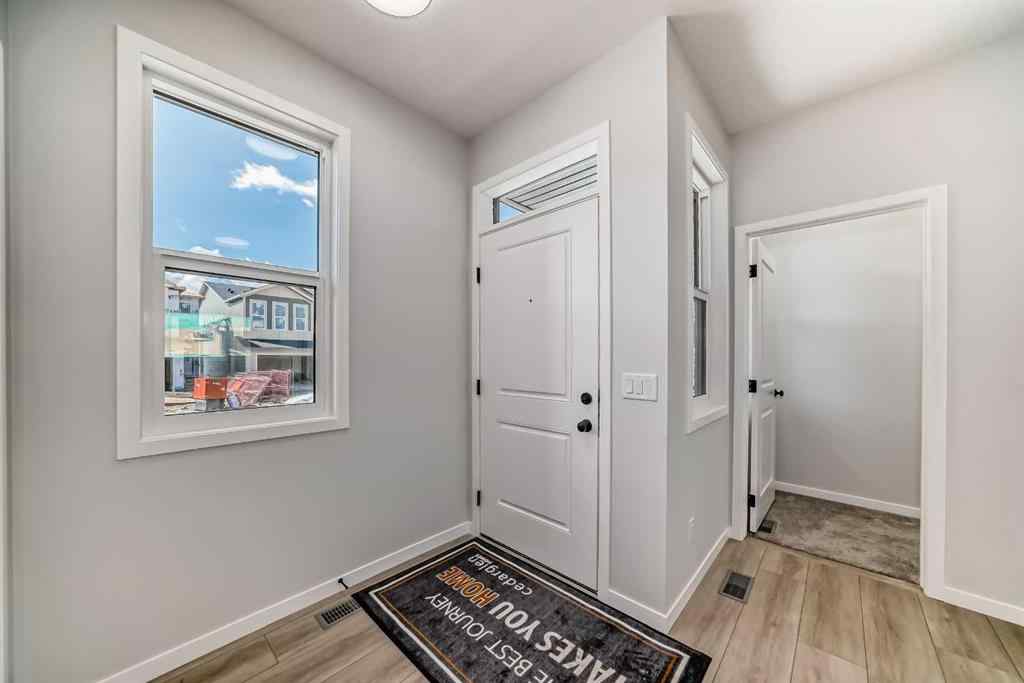 MLS® A2210904 - 208 Lucas Place NW in Livingston Calgary, Residential